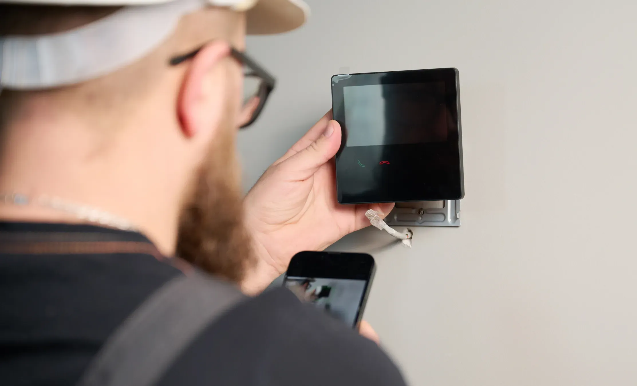 professional-installing-security-device